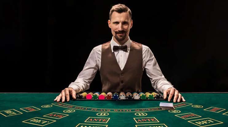 Tampilan meja baccarat Evolution Gaming di layar ponsel dengan dealer langsung, area taruhan, dan riwayat hasil di bawah.